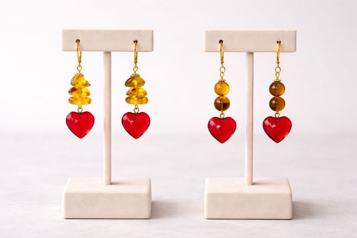 Dangle love earring by Eterno
