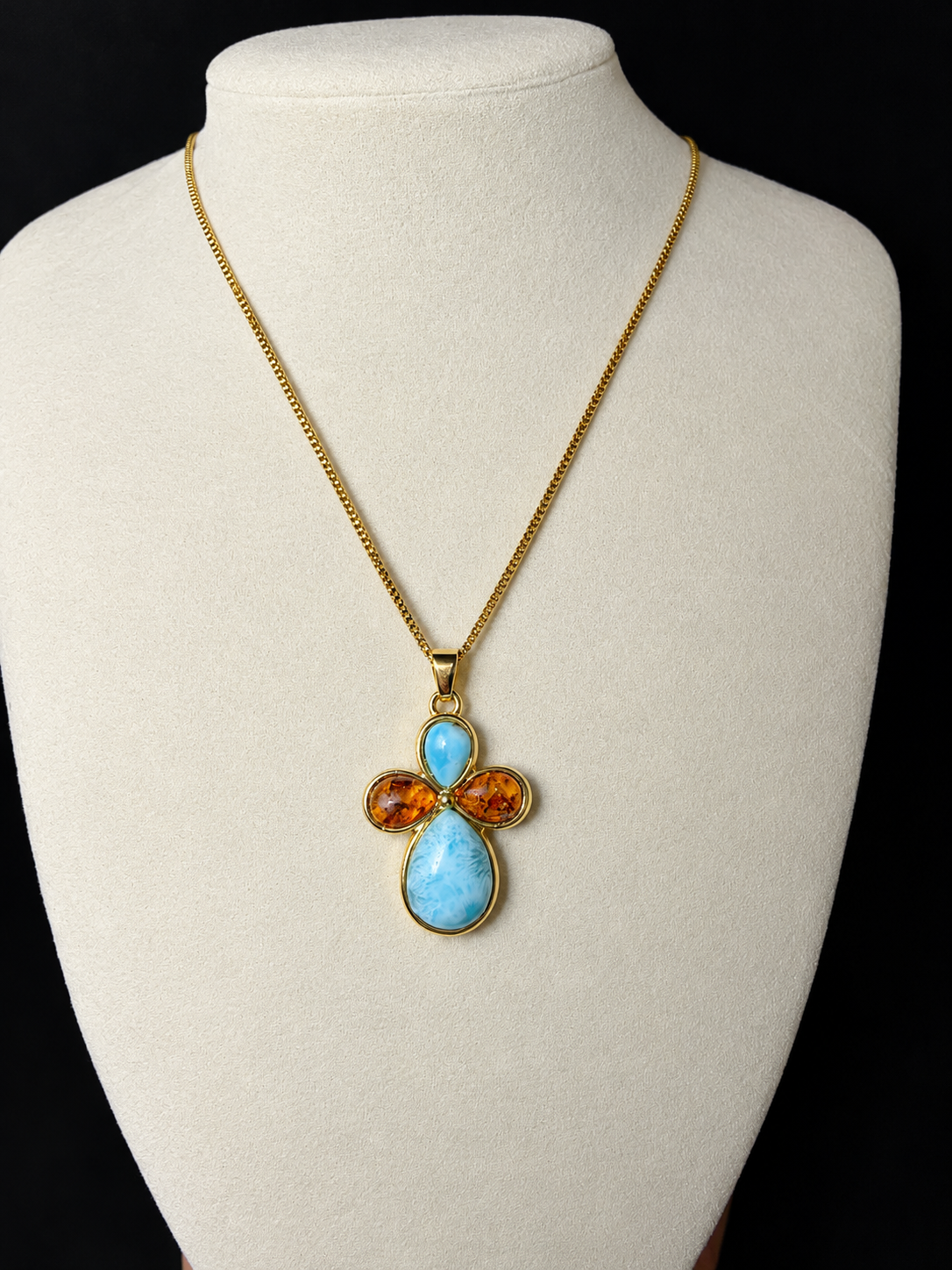 Cadena con cruz larimar y ambar