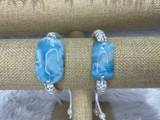 Man in blue bracelet