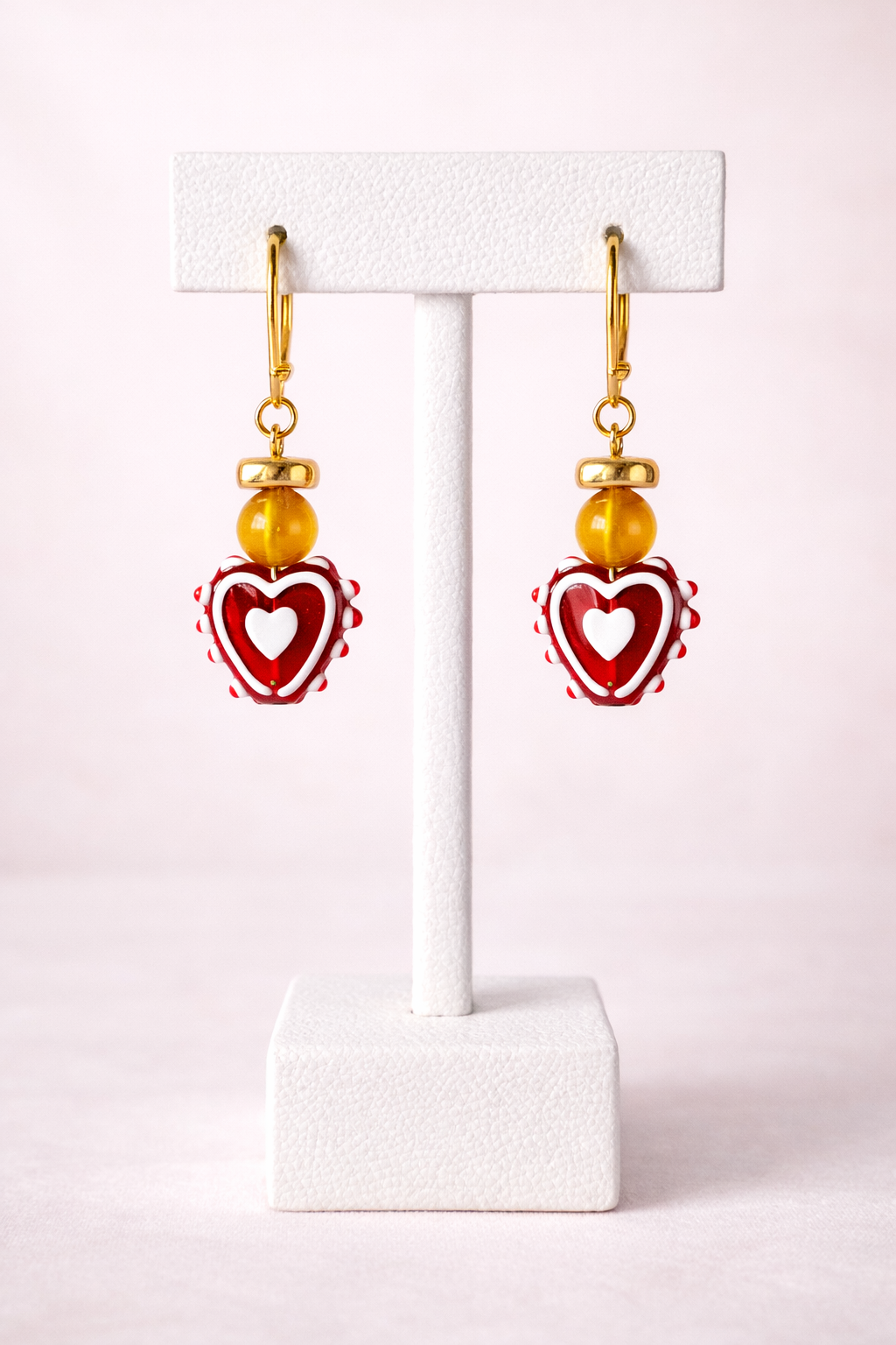 Dangle love earring by Eterno